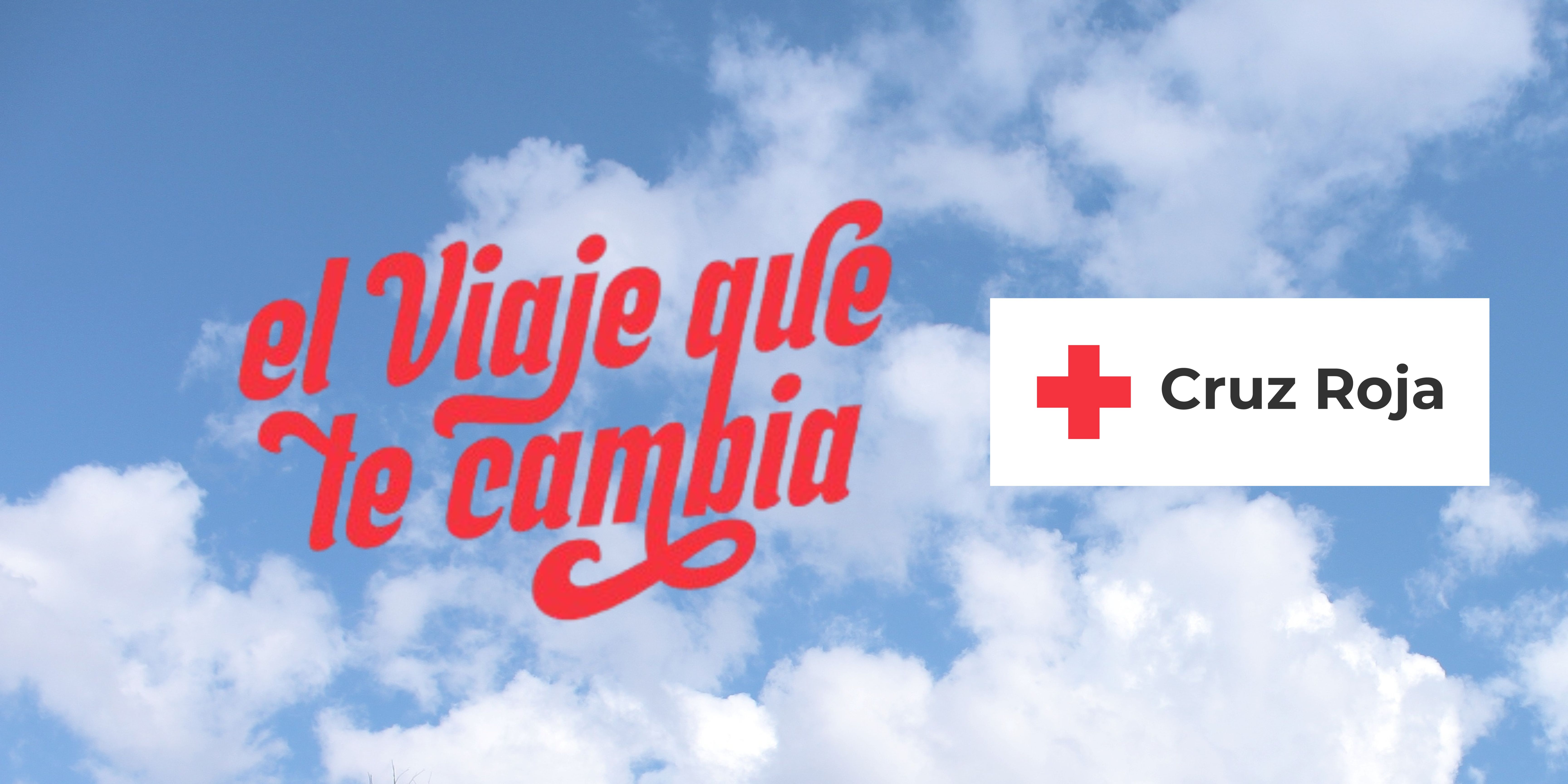Eslogan de la campaña de voluntariado con letras artísticas con el lema, el viaje que te cambia, sobre un fondo de cielo.